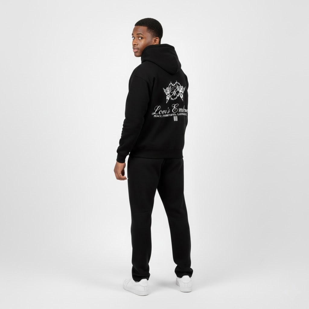 Back full body view of black Future Dreams zip hoodie by Rise One worn by model
